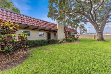 Turn-key 2 BR 2 BA condo in 55+ one-story villa community on The Dunedin Country Club in Florida - for sale on GolfHomes.com, golf home, golf lot