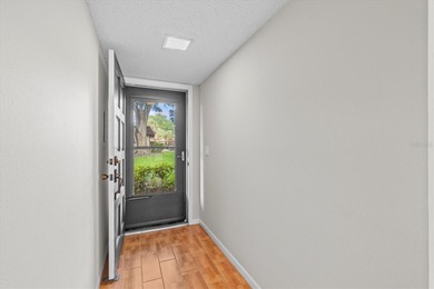 Turn-key 2 BR 2 BA condo in 55+ one-story villa community on The Dunedin Country Club in Florida - for sale on GolfHomes.com, golf home, golf lot