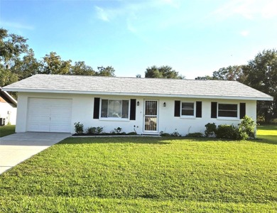 Move in ready pool home with 2 bedrooms, 1 & 1/2 baths & 1 car on Sherman Hills Golf Club in Florida - for sale on GolfHomes.com, golf home, golf lot