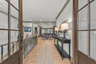 OVERLOOKING THE SIGNATURE 5TH HOLE OF THE JACK NICKLAUS DESIGNED on Great Waters Course At Reynolds Plantation in Georgia - for sale on GolfHomes.com, golf home, golf lot