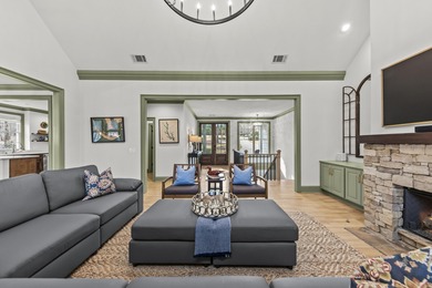 OVERLOOKING THE SIGNATURE 5TH HOLE OF THE JACK NICKLAUS DESIGNED on Great Waters Course At Reynolds Plantation in Georgia - for sale on GolfHomes.com, golf home, golf lot