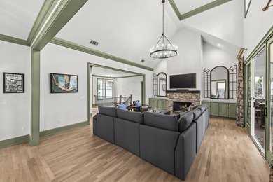 OVERLOOKING THE SIGNATURE 5TH HOLE OF THE JACK NICKLAUS DESIGNED on Great Waters Course At Reynolds Plantation in Georgia - for sale on GolfHomes.com, golf home, golf lot