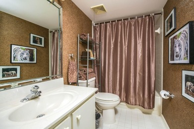 Delightful Eastpointe condo with gorgeous lake and golf views on Old Marsh Golf Club in Florida - for sale on GolfHomes.com, golf home, golf lot