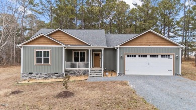 Welcome to first floor living at its finest.  This beautifully on Reedy Creek Golf Course in North Carolina - for sale on GolfHomes.com, golf home, golf lot