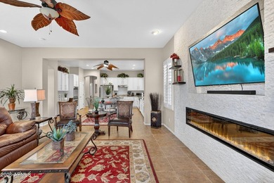 Located in the highly sought-after Estates at Johnson Ranch and on The Golf Club At Johnson Ranch in Arizona - for sale on GolfHomes.com, golf home, golf lot