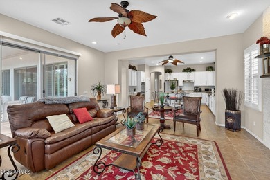 Located in the highly sought-after Estates at Johnson Ranch and on The Golf Club At Johnson Ranch in Arizona - for sale on GolfHomes.com, golf home, golf lot