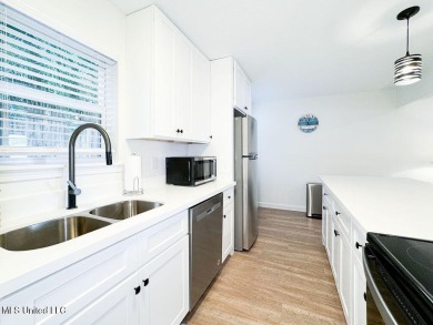 Fabulous condo located in the heart of downtown Ocean Springs on Gulf Hills Golf Club in Mississippi - for sale on GolfHomes.com, golf home, golf lot