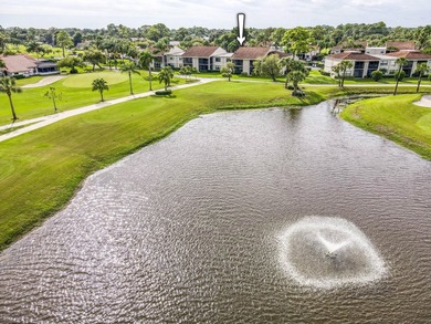 Delightful Eastpointe condo with gorgeous lake and golf views on Old Marsh Golf Club in Florida - for sale on GolfHomes.com, golf home, golf lot