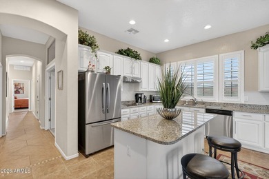 Located in the highly sought-after Estates at Johnson Ranch and on The Golf Club At Johnson Ranch in Arizona - for sale on GolfHomes.com, golf home, golf lot