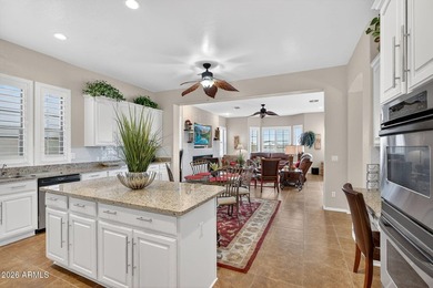 Located in the highly sought-after Estates at Johnson Ranch and on The Golf Club At Johnson Ranch in Arizona - for sale on GolfHomes.com, golf home, golf lot