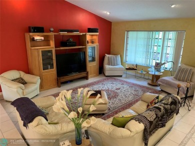 A truly spacious 3 BR/2 BA waterfront home on a cul-de-sac and on Woodmont Country Club in Florida - for sale on GolfHomes.com, golf home, golf lot