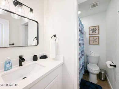 Fabulous condo located in the heart of downtown Ocean Springs on Gulf Hills Golf Club in Mississippi - for sale on GolfHomes.com, golf home, golf lot