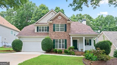 Discover this beautifully maintained 5-bedroom, 3.5 bath home on Summergrove Golf Club in Georgia - for sale on GolfHomes.com, golf home, golf lot