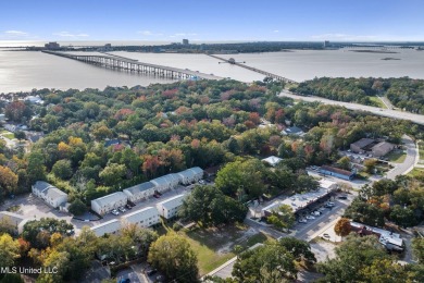 Fabulous condo located in the heart of downtown Ocean Springs on Gulf Hills Golf Club in Mississippi - for sale on GolfHomes.com, golf home, golf lot