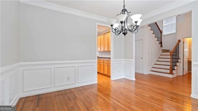 Discover this beautifully maintained 5-bedroom, 3.5 bath home on Summergrove Golf Club in Georgia - for sale on GolfHomes.com, golf home, golf lot