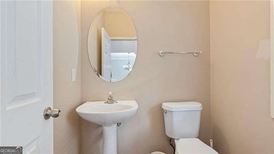 Discover this beautifully maintained 5-bedroom, 3.5 bath home on Summergrove Golf Club in Georgia - for sale on GolfHomes.com, golf home, golf lot