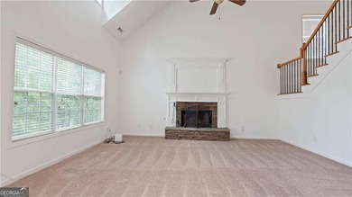 Discover this beautifully maintained 5-bedroom, 3.5 bath home on Summergrove Golf Club in Georgia - for sale on GolfHomes.com, golf home, golf lot