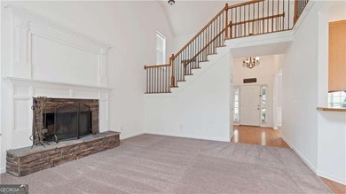 Discover this beautifully maintained 5-bedroom, 3.5 bath home on Summergrove Golf Club in Georgia - for sale on GolfHomes.com, golf home, golf lot