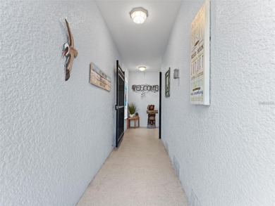 Private beach club living without the beachfront price tag! This on Gulf Harbors Golf Course in Florida - for sale on GolfHomes.com, golf home, golf lot