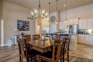 Waterfront Villa in a highly-desirable neighborhood community on Seasons Ridge At Four Seasons in Missouri - for sale on GolfHomes.com, golf home, golf lot