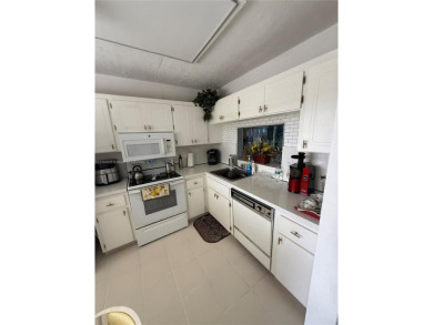 Cozy 2/2 Condo with relaxing view of the garden, the pool and a on Inverrary Country Club in Florida - for sale on GolfHomes.com, golf home, golf lot