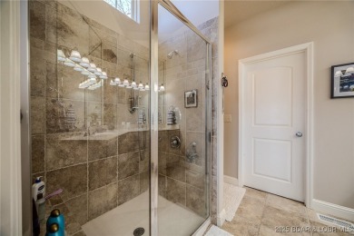 Waterfront Villa in a highly-desirable neighborhood community on Seasons Ridge At Four Seasons in Missouri - for sale on GolfHomes.com, golf home, golf lot