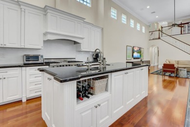 Step into an enchanting oasis in the heart of Woodfield Country on Woodfield Country Club in Florida - for sale on GolfHomes.com, golf home, golf lot