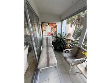 Cozy 2/2 Condo with relaxing view of the garden, the pool and a on Inverrary Country Club in Florida - for sale on GolfHomes.com, golf home, golf lot