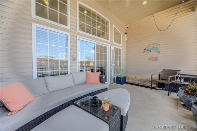 Waterfront Villa in a highly-desirable neighborhood community on Seasons Ridge At Four Seasons in Missouri - for sale on GolfHomes.com, golf home, golf lot