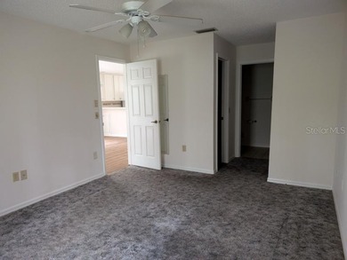 Nice 2 Bedroom 2 Bathroom End Unit Villa Located on in the Quiet on Meadow Oaks Golf and Country Club in Florida - for sale on GolfHomes.com, golf home, golf lot