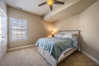 Waterfront Villa in a highly-desirable neighborhood community on Seasons Ridge At Four Seasons in Missouri - for sale on GolfHomes.com, golf home, golf lot