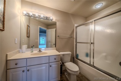 Waterfront Villa in a highly-desirable neighborhood community on Seasons Ridge At Four Seasons in Missouri - for sale on GolfHomes.com, golf home, golf lot
