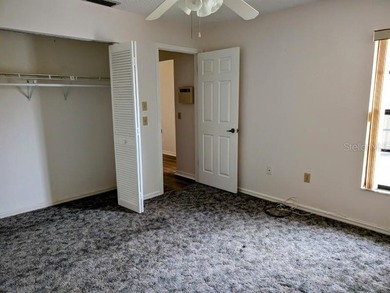 Nice 2 Bedroom 2 Bathroom End Unit Villa Located on in the Quiet on Meadow Oaks Golf and Country Club in Florida - for sale on GolfHomes.com, golf home, golf lot