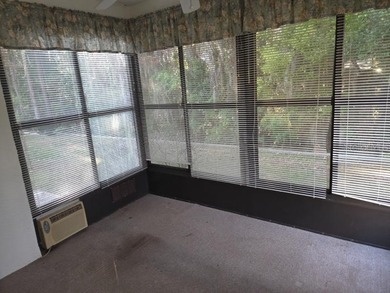 Nice 2 Bedroom 2 Bathroom End Unit Villa Located on in the Quiet on Meadow Oaks Golf and Country Club in Florida - for sale on GolfHomes.com, golf home, golf lot