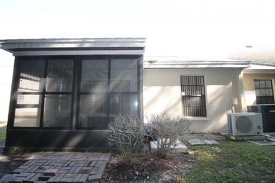 Nice 2 Bedroom 2 Bathroom End Unit Villa Located on in the Quiet on Meadow Oaks Golf and Country Club in Florida - for sale on GolfHomes.com, golf home, golf lot