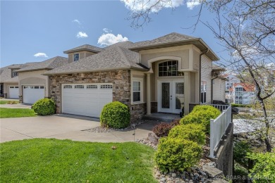 Waterfront Villa in a highly-desirable neighborhood community on Seasons Ridge At Four Seasons in Missouri - for sale on GolfHomes.com, golf home, golf lot