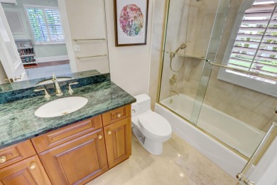 Step into an enchanting oasis in the heart of Woodfield Country on Woodfield Country Club in Florida - for sale on GolfHomes.com, golf home, golf lot