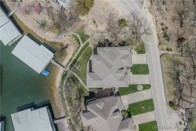 Waterfront Villa in a highly-desirable neighborhood community on Seasons Ridge At Four Seasons in Missouri - for sale on GolfHomes.com, golf home, golf lot