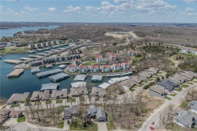 Waterfront Villa in a highly-desirable neighborhood community on Seasons Ridge At Four Seasons in Missouri - for sale on GolfHomes.com, golf home, golf lot