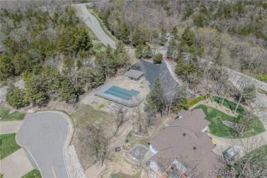 Waterfront Villa in a highly-desirable neighborhood community on Seasons Ridge At Four Seasons in Missouri - for sale on GolfHomes.com, golf home, golf lot