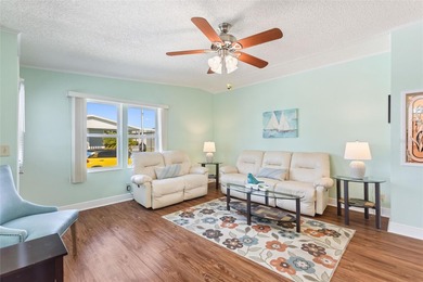 This beautifully maintained, Sun Manufactured home is ONE OF THE on Sweetwater Golf and Tennis Club in Florida - for sale on GolfHomes.com, golf home, golf lot