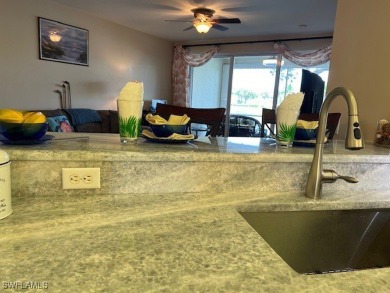 PRICE REDUCED-MOVE IN READY!!! ENJOY SPECTACULAR SUNSETS AND on Colonial Country Club in Florida - for sale on GolfHomes.com, golf home, golf lot