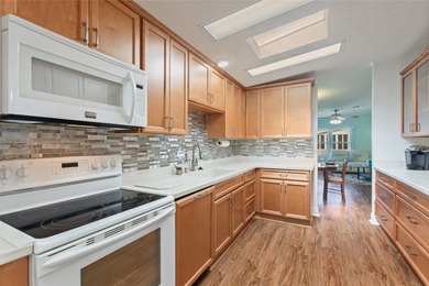 This beautifully maintained, Sun Manufactured home is ONE OF THE on Sweetwater Golf and Tennis Club in Florida - for sale on GolfHomes.com, golf home, golf lot