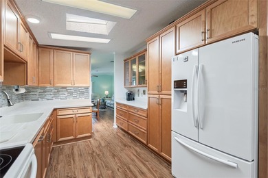 This beautifully maintained, Sun Manufactured home is ONE OF THE on Sweetwater Golf and Tennis Club in Florida - for sale on GolfHomes.com, golf home, golf lot