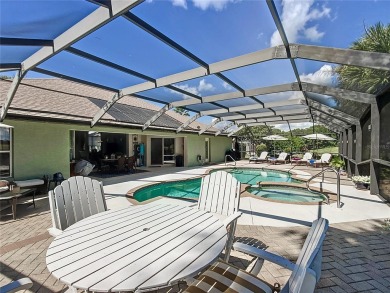 Absolutely gorgeous 3/2 pool home with a bonus room located on LakeSide Country Club in Florida - for sale on GolfHomes.com, golf home, golf lot