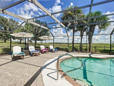 Absolutely gorgeous 3/2 pool home with a bonus room located on LakeSide Country Club in Florida - for sale on GolfHomes.com, golf home, golf lot