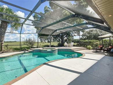 Absolutely gorgeous 3/2 pool home with a bonus room located on LakeSide Country Club in Florida - for sale on GolfHomes.com, golf home, golf lot