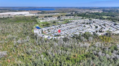 This beautifully maintained, Sun Manufactured home is ONE OF THE on Sweetwater Golf and Tennis Club in Florida - for sale on GolfHomes.com, golf home, golf lot