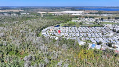 This beautifully maintained, Sun Manufactured home is ONE OF THE on Sweetwater Golf and Tennis Club in Florida - for sale on GolfHomes.com, golf home, golf lot