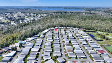 This beautifully maintained, Sun Manufactured home is ONE OF THE on Sweetwater Golf and Tennis Club in Florida - for sale on GolfHomes.com, golf home, golf lot